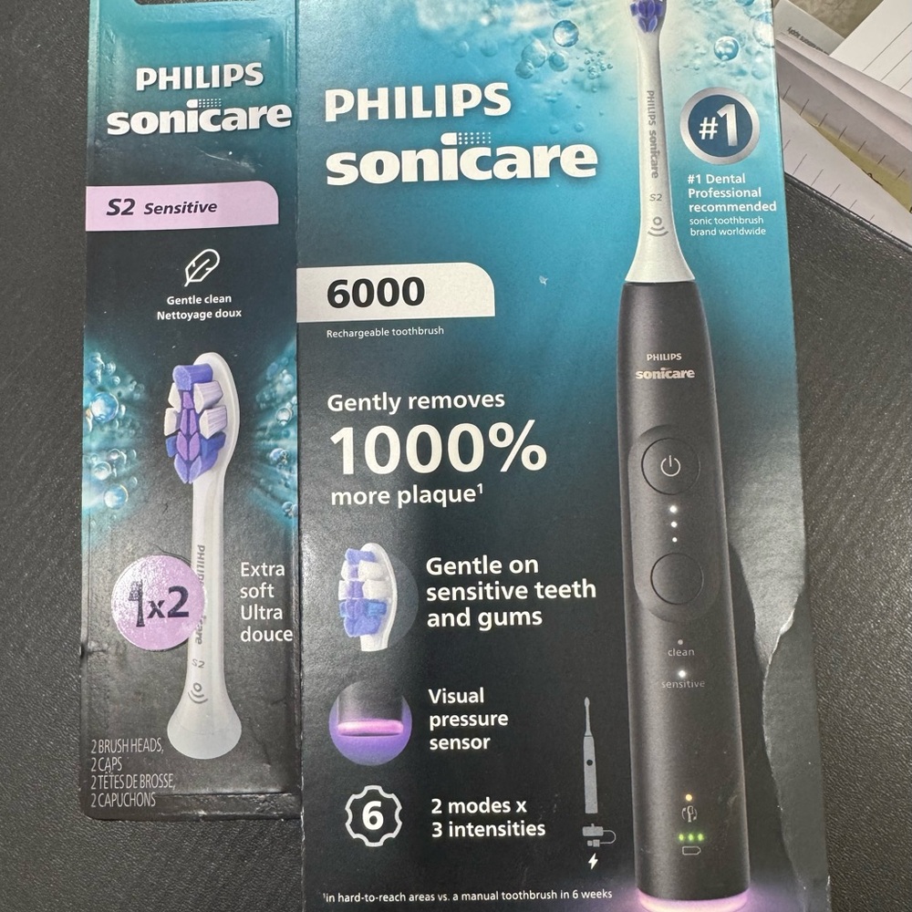 Philips Sonicare 6000 electric toothbrush with 2 extra Brush Heads
